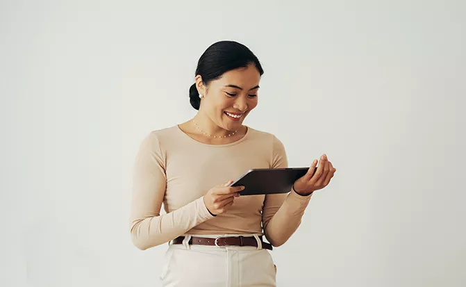 Woman holding a digital tablet